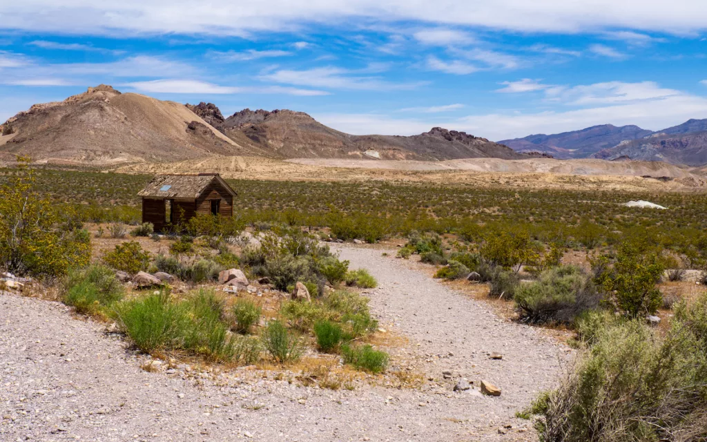 A cabin in the middle of the desert.