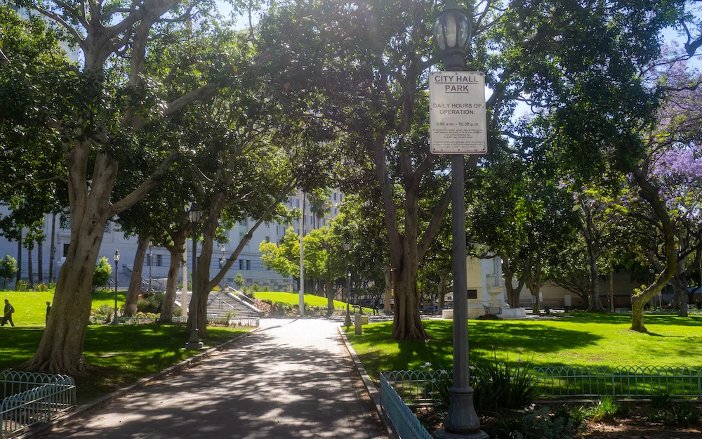 We cross City Hall Park...